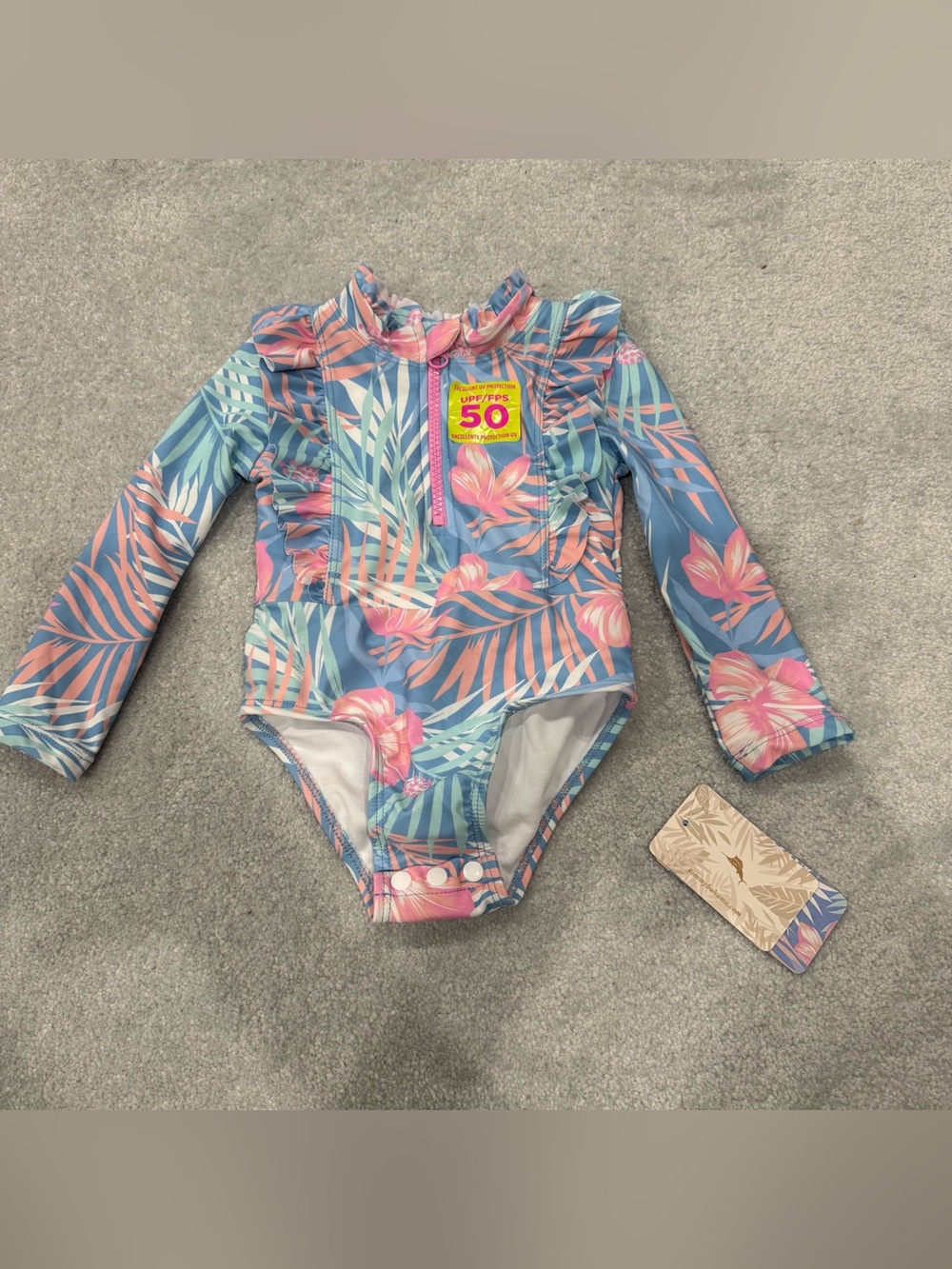 Tommy Bahama Girls Tropical Floral Long Sleeve One-Piece Swim in Blue and Pink